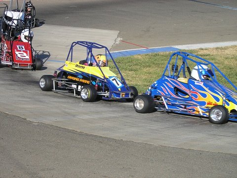 A young Jared Williams in a flamed Quarter Midget race car.