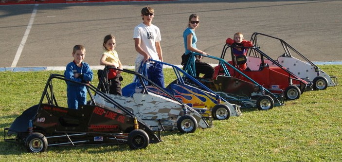 Jared, Rachel, Kaylee, Nick & Levi Williams racing Quarter Midgets.
